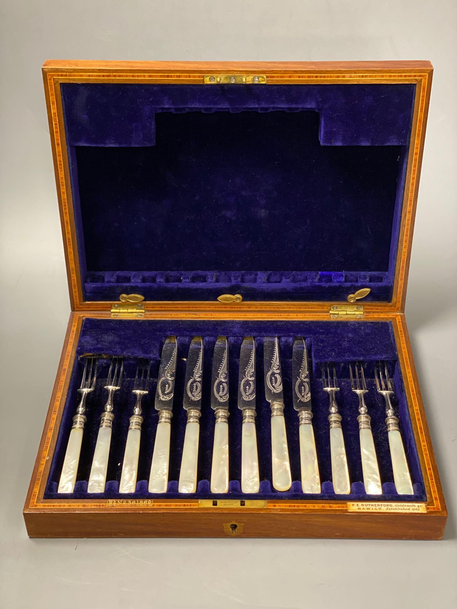 A cased set of plated dessert knives and forks with mother of pearl handles